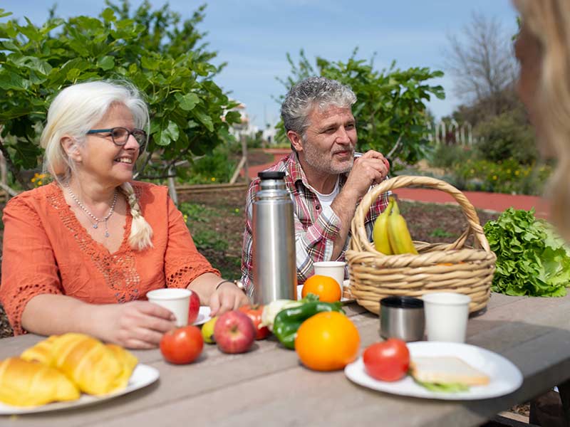 Elderly Woman enjoying a picnic