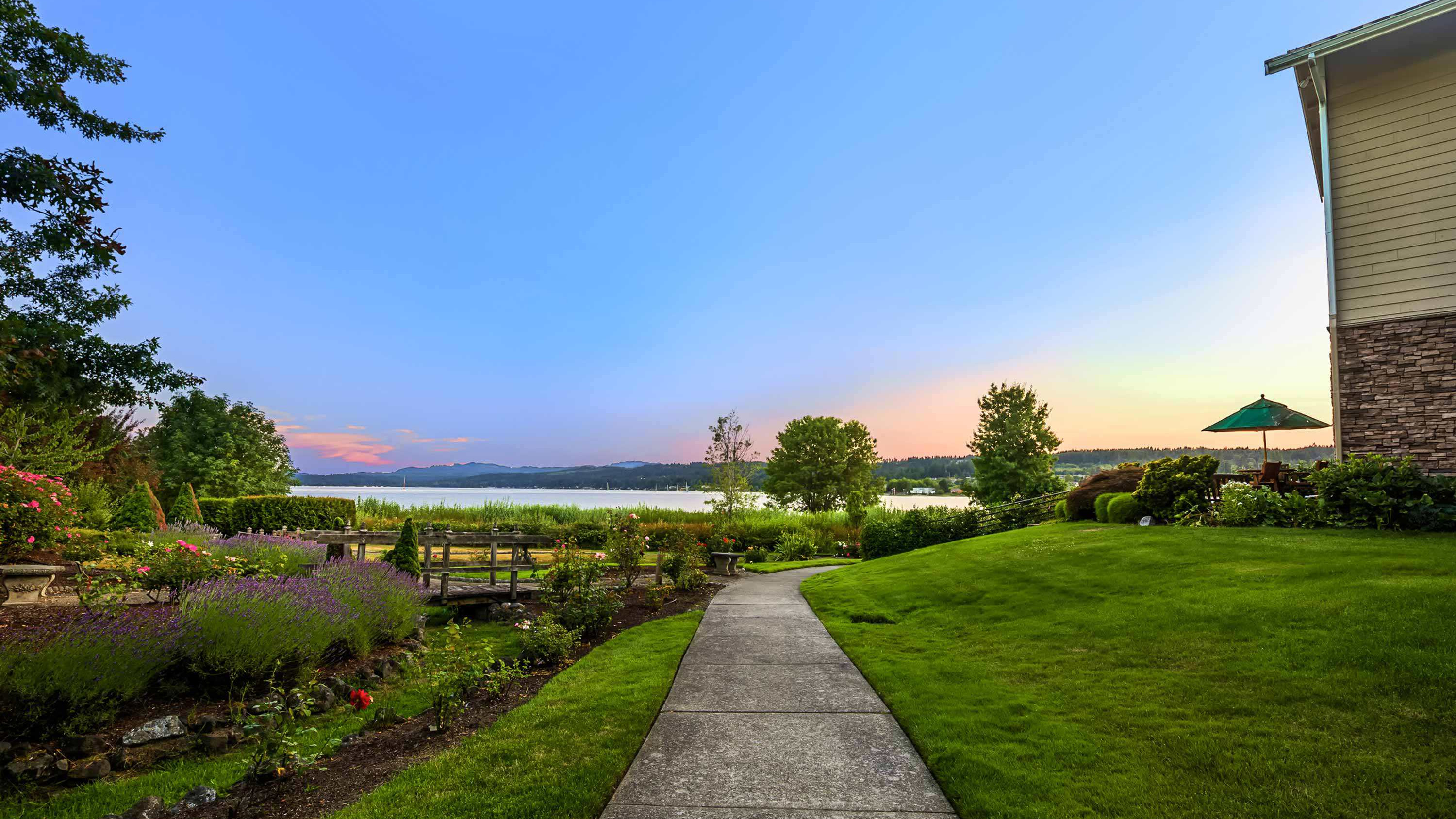 Crista Shores garden, walkway, and waterfront