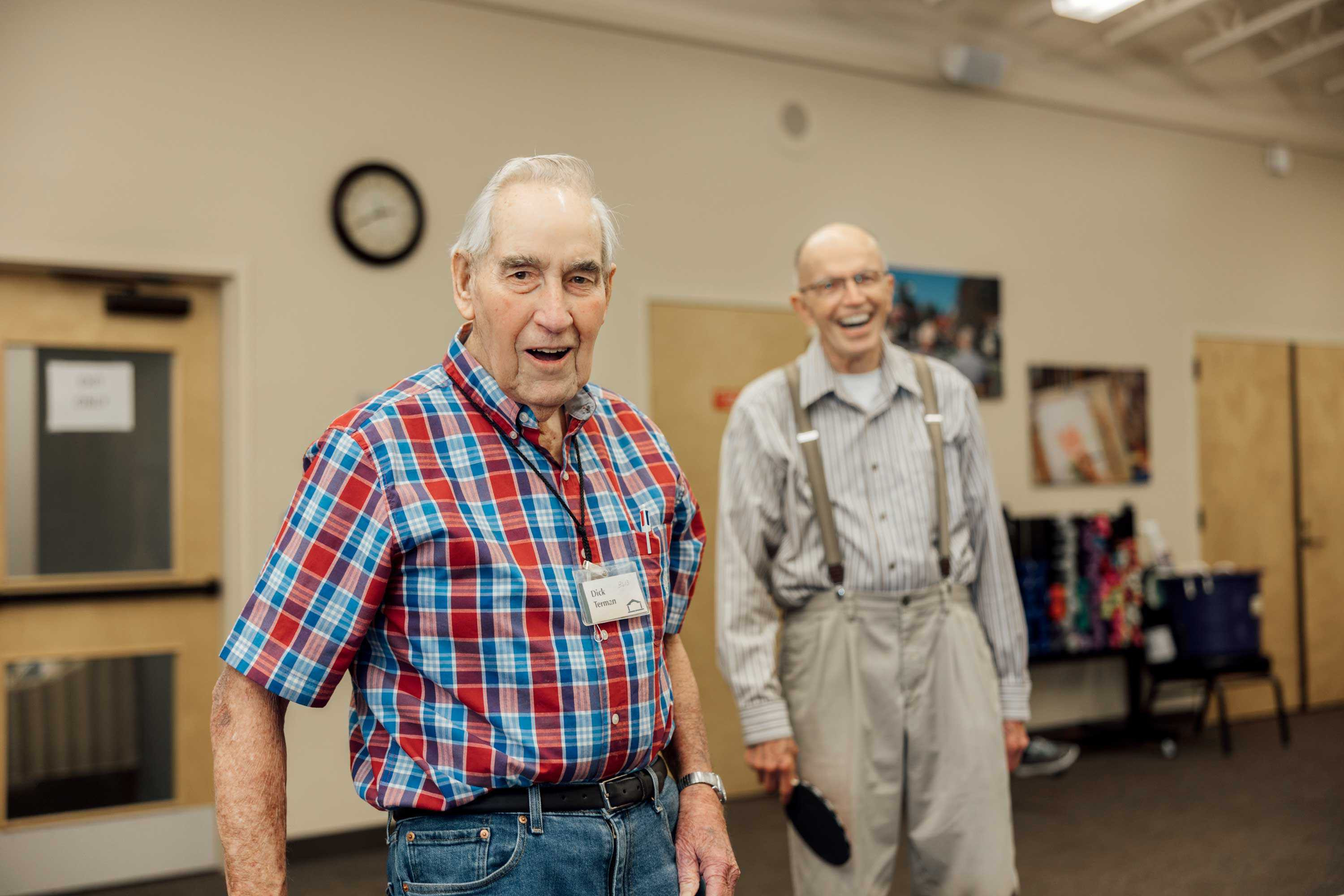 Residents playing ping pong in the Rec Room at Crista Shores Independent Living