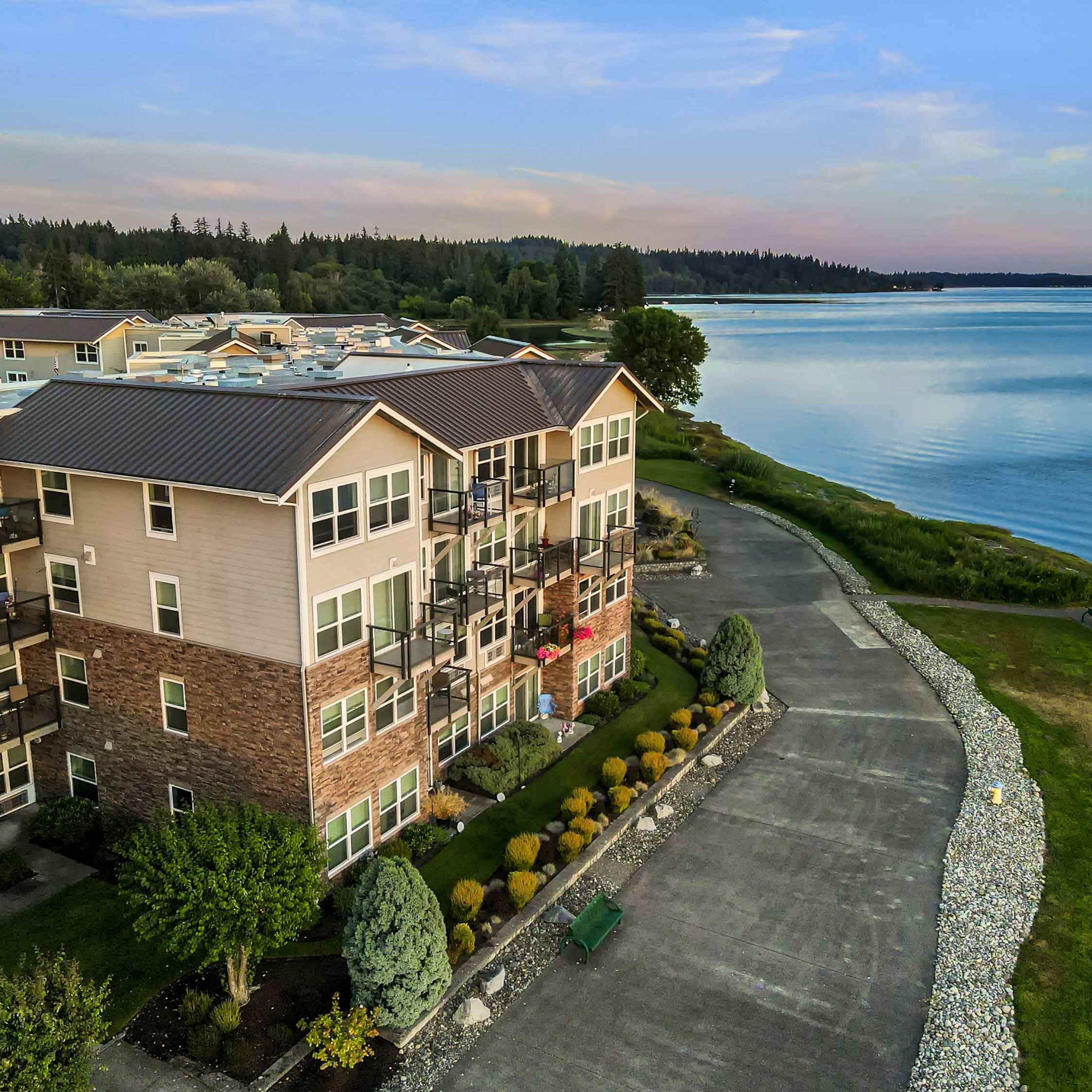 Aerial view of Crista Shores apartments and Dyes Inlet