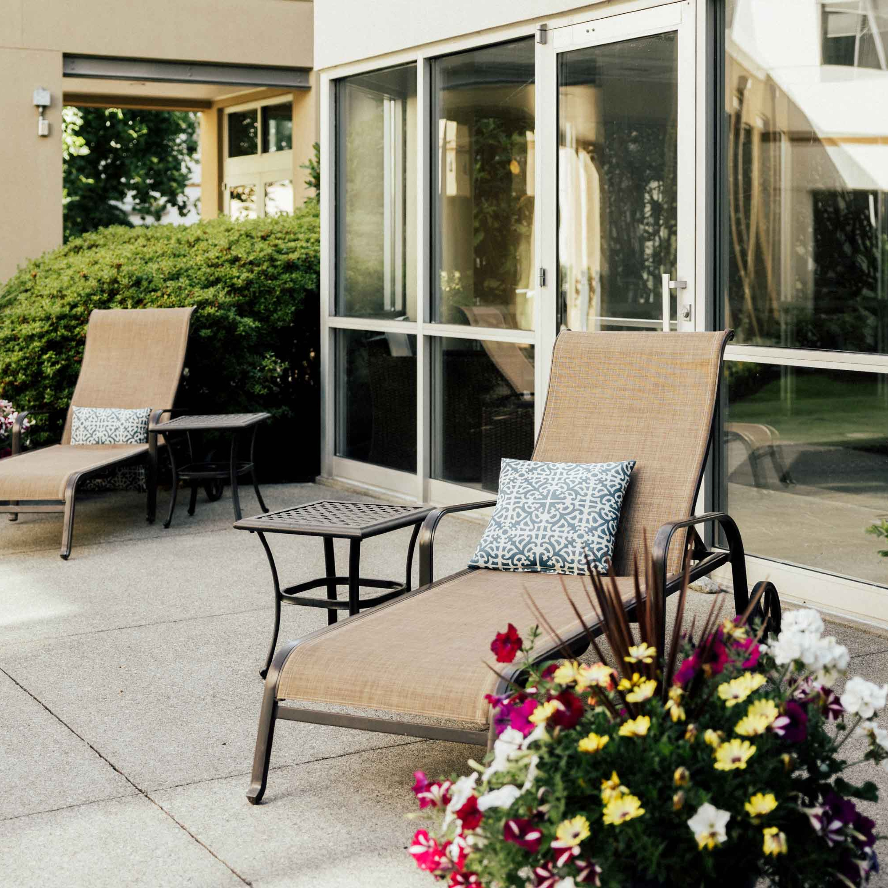 Comfy patio chairs at Cristwood invite relaxation