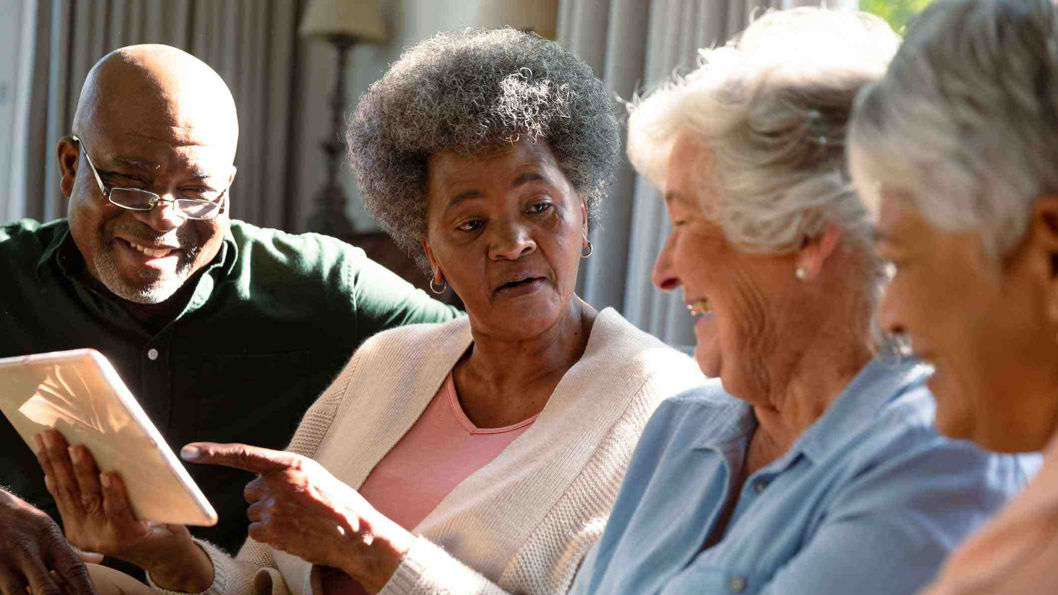 Group of seniors enjoy conversation
